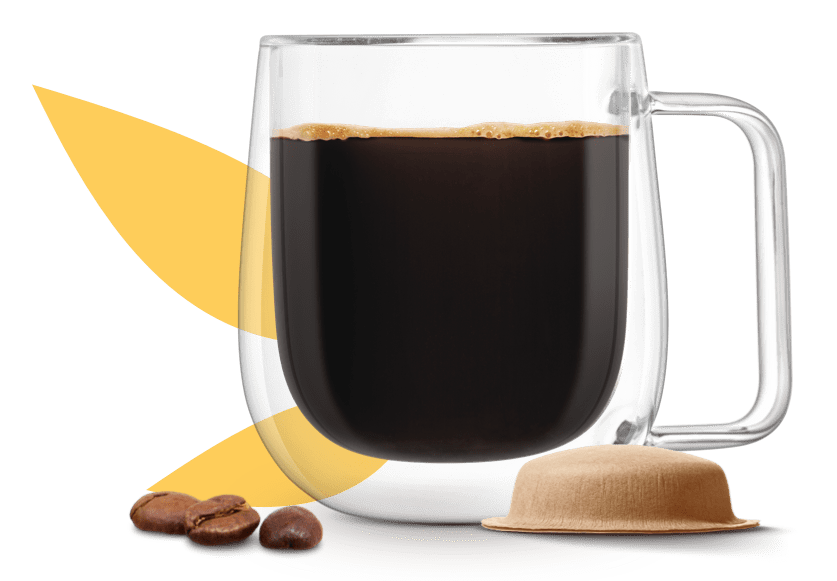 ch&aacute;vena de caf&eacute; junto a uma c&aacute;psula &agrave; base de papel