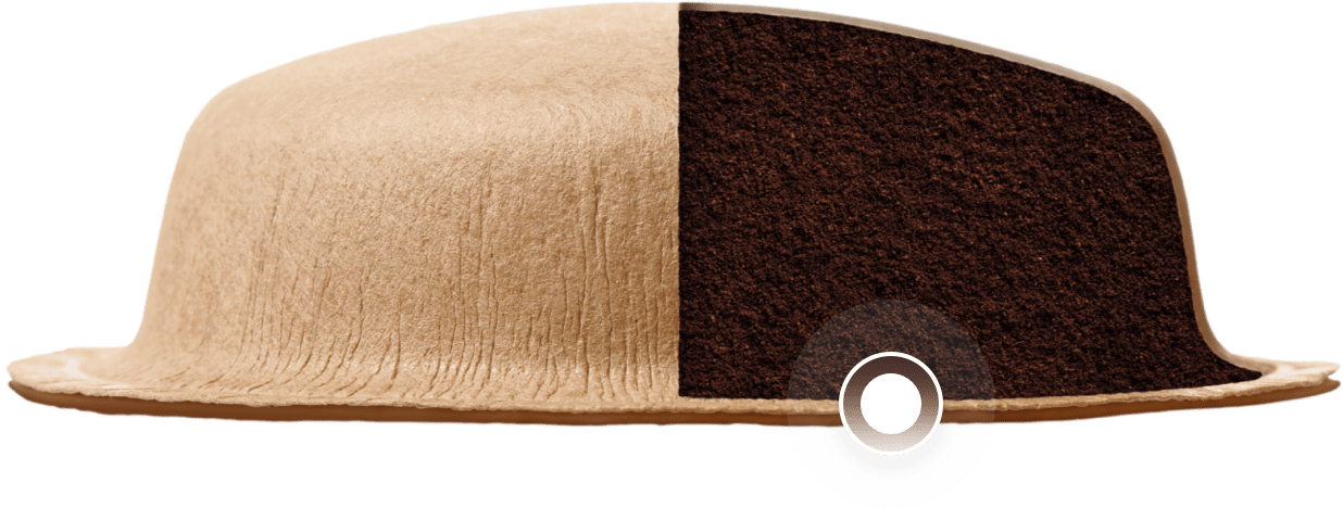 Cápsula de café cortada com visibilidade do café